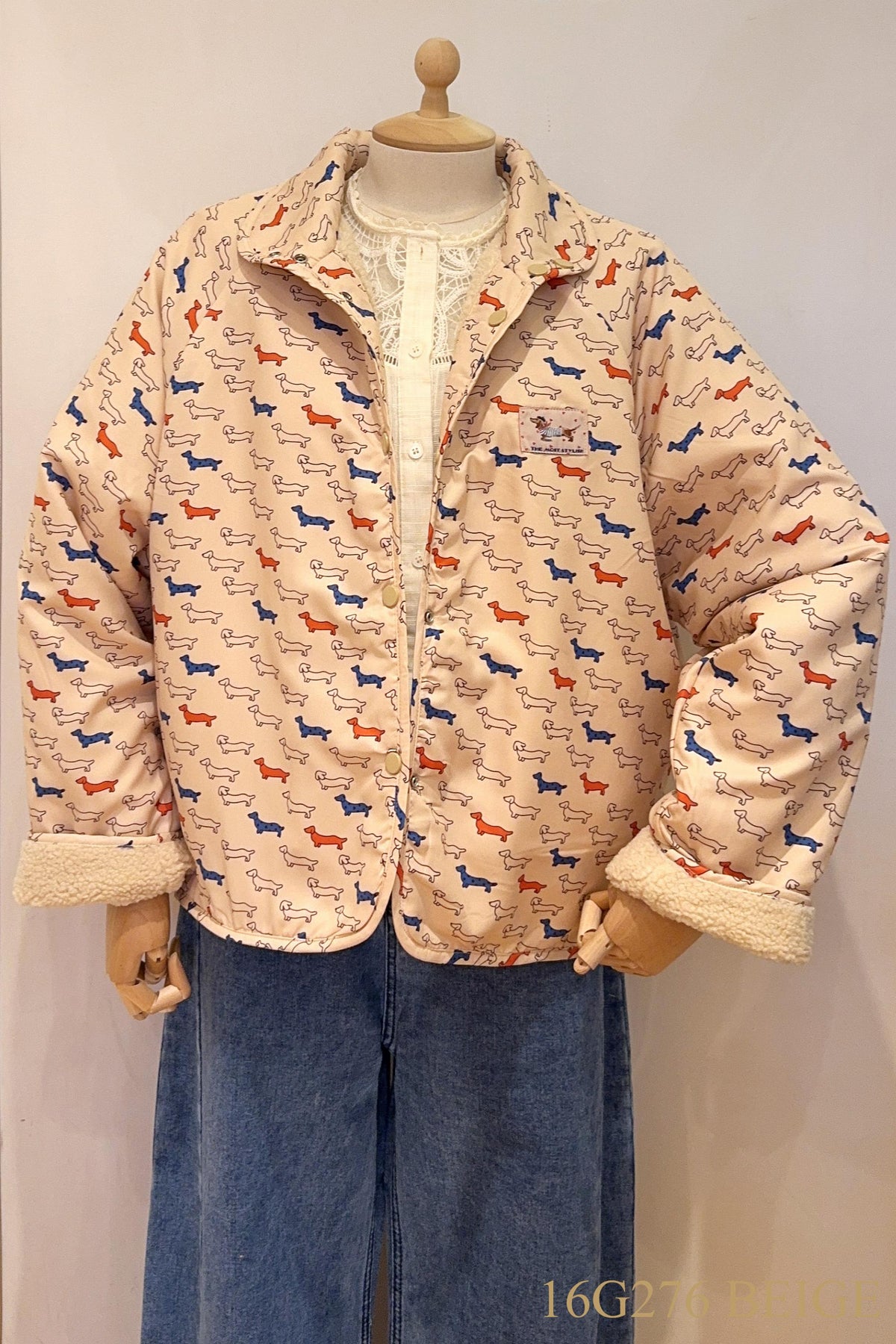 Reversibel teddy coat with teckels