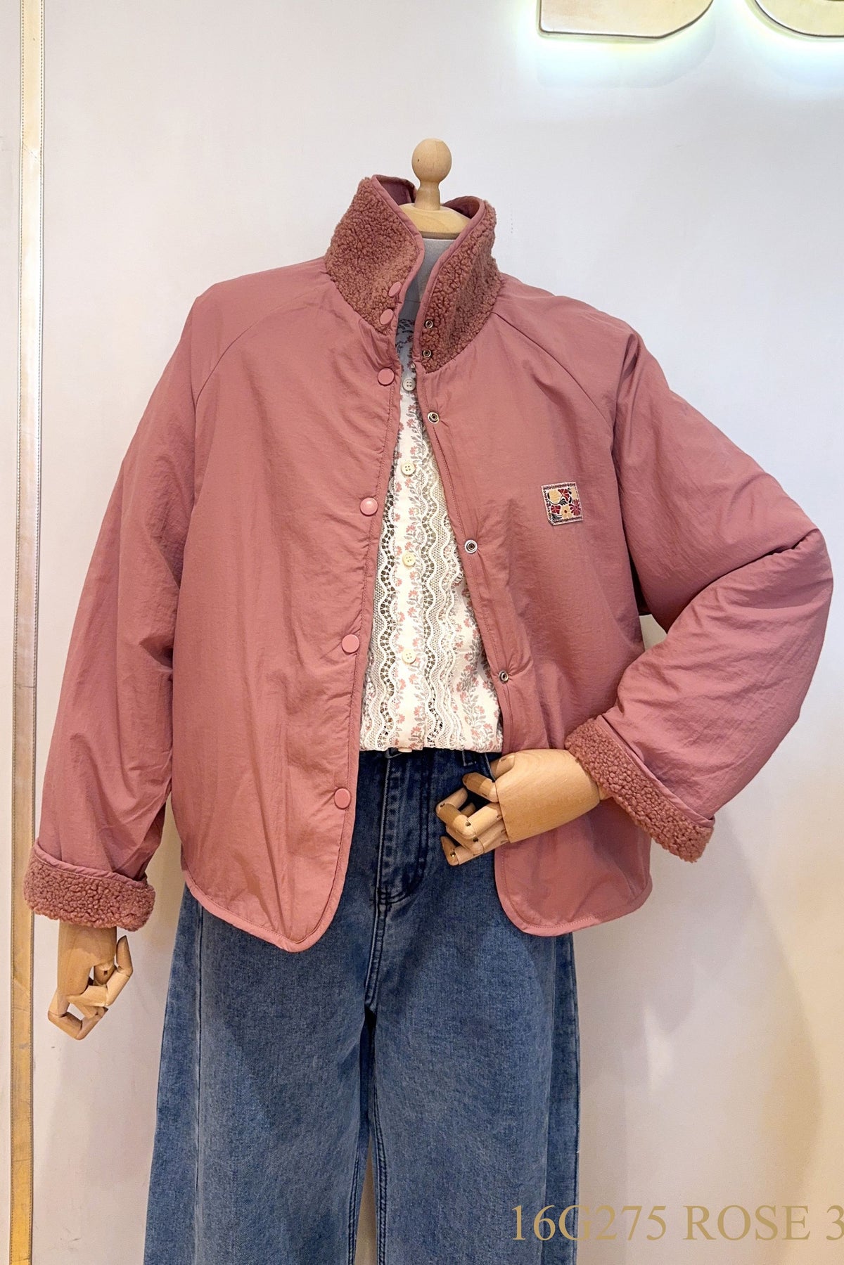 Reversibel teddy coat with patch