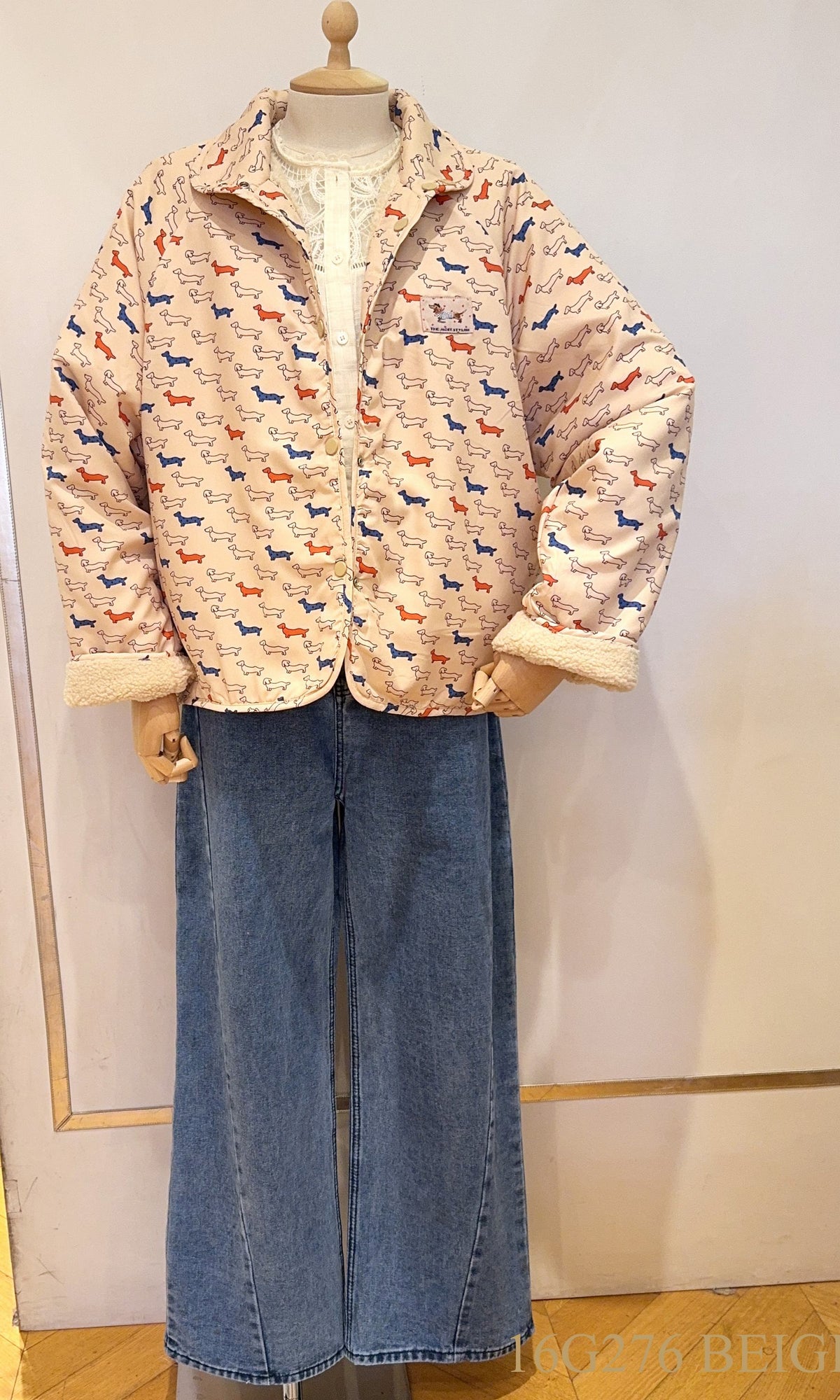 Reversibel teddy coat with teckels
