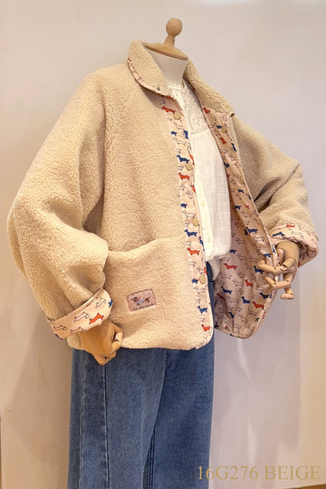 Reversibel teddy coat with teckels